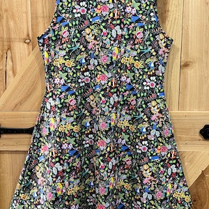 Disney floral character print dress. Peter Pan, Snow White, Alice, for women with pockets plus size and regular, sleeveless and short sleeve