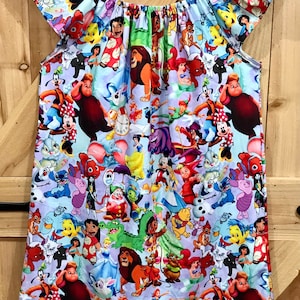 Disney dress Mommy and Me flutter sleeve, Minnie Mickey and all the Disney characters girls and ladies dress ready to ship