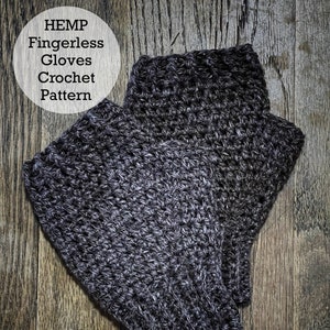 May include: A pair of gray fingerless gloves made with hemp yarn. The gloves are crocheted and have a textured look. The image includes the text "HEMP Fingerless Gloves Crochet Pattern".