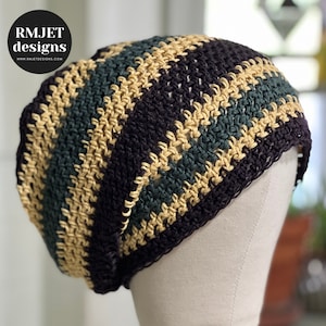 May include: A crocheted hat with stripes of beige, dark green, and black yarn. The hat is on a white mannequin head.