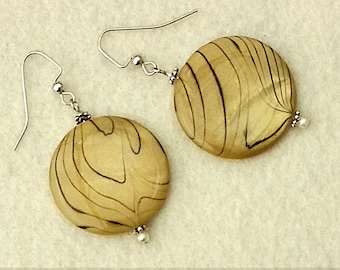 Olive green statement earrings with big striped shell lentils