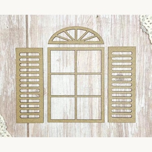 May include: A wooden window frame with an arched top and two shutters. The window has six panes and the shutters have horizontal slats. The pieces are made of light brown wood and are set against a light wood grain background.