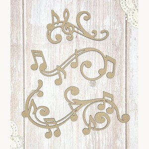 May include: Three wooden musical note cutouts in varying sizes and designs. The cutouts are a light brown color and feature treble clefs, eighth notes, and curved lines. The background is a light wood grain.