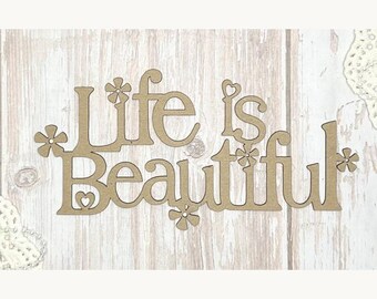 May include: A wooden cutout with the phrase "Life is Beautiful" in a decorative font. The letters are adorned with floral and heart accents. The cutout is light brown and set against a light wood-grain background.