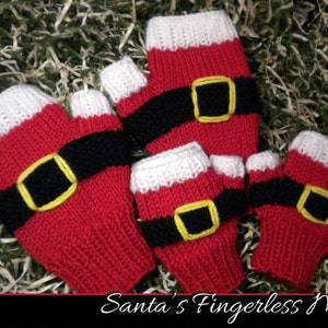 May include: Set of five red and white fingerless mittens with black and yellow belts. The mittens are knitted and have a Santa Claus theme.