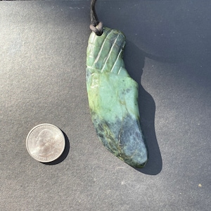Jade knife pendant