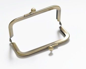 Telaio per mini borsa da incollare Kisslock con testa a sfera in bronzo 8,5 cm (3")