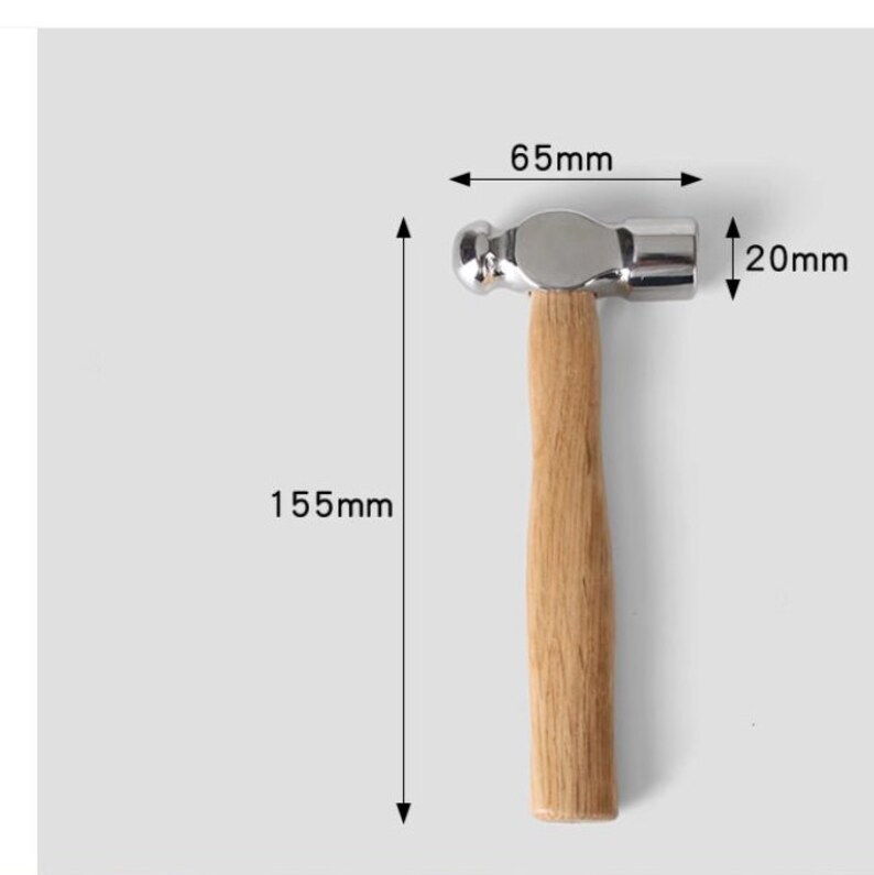 May include: A silver ball-peen hammer with a wooden handle. The hammer is 6.5 inches long and 2 inches wide. The handle is 15.5 inches long.