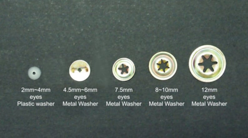 May include: Five metal eyelets with star-shaped openings, ranging in size from 2mm to 12mm. The eyelets are arranged from smallest to largest. The eyelets are used for attaching fabric or other materials to a surface. The eyelets are made of metal and have a shiny finish.