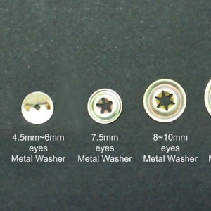 May include: Five metal eyelets with star-shaped openings, ranging in size from 2mm to 12mm. The eyelets are arranged in a row from smallest to largest. The eyelets are used for attaching fabric or other materials to a surface. The eyelets are made of metal and have a silver finish. The eyelets are also known as grommets.