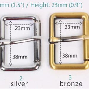 May include: Four metal belt buckles in different finishes: gunmetal, silver, bronze, and light gold. Each buckle measures 1.5 inches wide and 0.9 inches high.