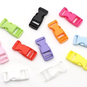 May include: Assortment of ten plastic side release buckles in various colours, including black, green, pink, red, orange, purple, blue, yellow, white, and clear.
