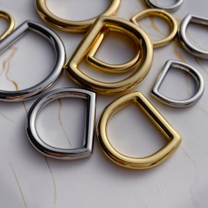 2 st. set D-ringar, innerstorlek 10,5 mm/12 mm/15 mm/18 mm/21 mm/25 mm. Välj färg.