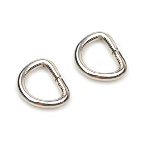 May include: Two silver D-rings, also known as key rings, are shown against a white background.