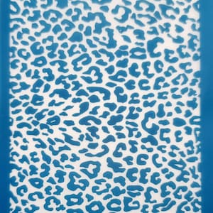 May include: Blue and white leopard print stencil. The stencil is made of a flexible material and is designed for use with paint or other mediums.