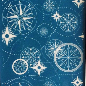 May include: A blue background with a repeating pattern of white compass designs. The compass designs include a compass rose with the cardinal directions and a star with four points.