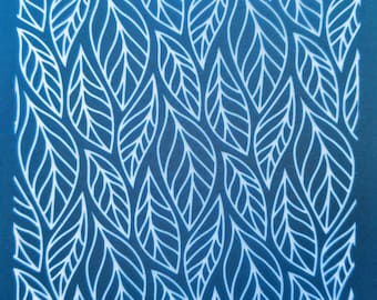 May include: A blue background with a white pattern of overlapping leaves. The pattern is repeated throughout the image. The text "MOKKO 12 10" is at the bottom of the image.