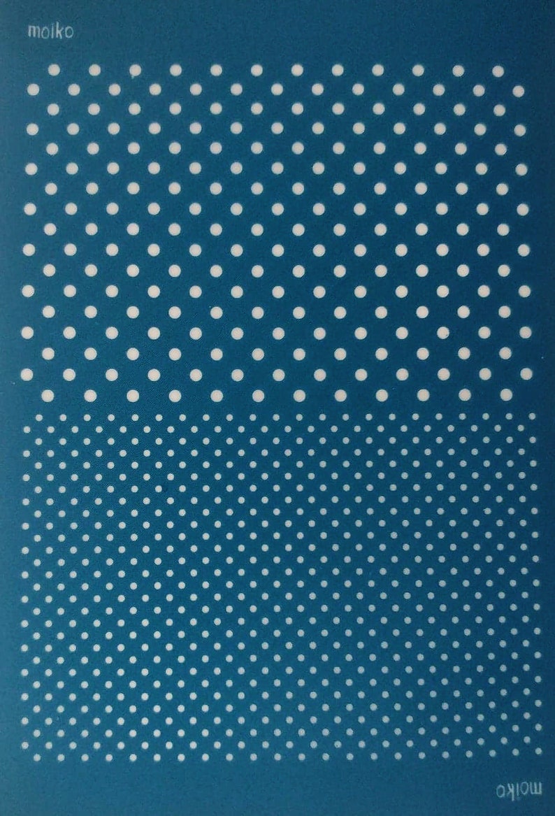 May include: A blue stencil with a pattern of white dots. The top half of the stencil has a regular pattern of dots, while the bottom half has a diagonal pattern of dots.