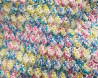 Multi Pastel Colored Crocheted Baby Blanket. Size of this blanket is 35"X33"