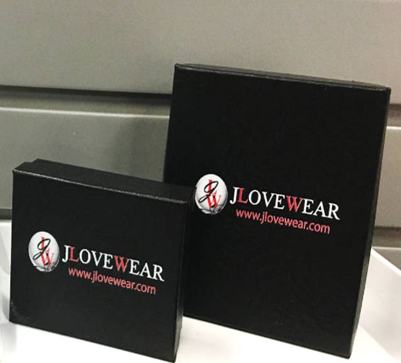 May include: Two black boxes with the logo "JLOVEWEAR" and the website address "www.jlovewear.com" printed in white and red.