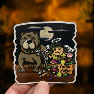 May include: A cartoon sticker featuring a dog wearing a collar that says "Trick" and a girl holding a bag that says "Trick or Treat". The sticker is set against a night sky with a full moon and stars.