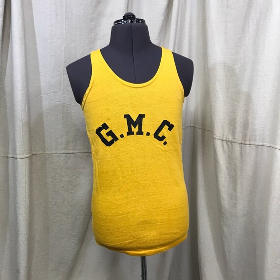 yellow athletic top