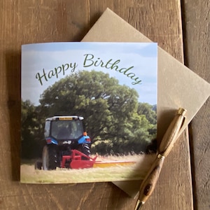 farming birthday card - tractor working in field with happy birthday written above - tractor birthday card