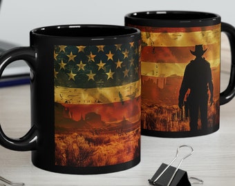 Patriot Cowboy Mug - Man out west where USA flag fills the sky on Black 11 or 15 oz coffee cup