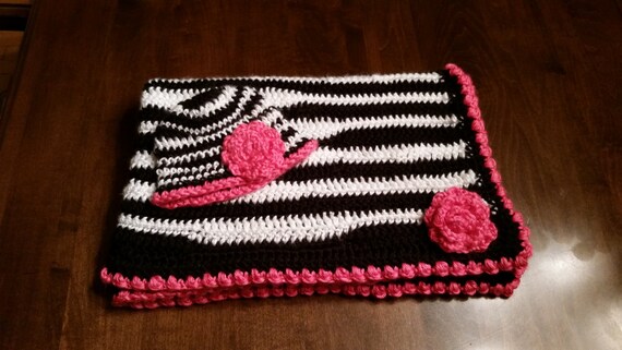 zebra blanket with pink trim