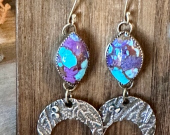 Long Mohave turquoise and silver earrings with hanging coral textured moons. Purple and turquoise silver drop earrings. Coral moon earrings.