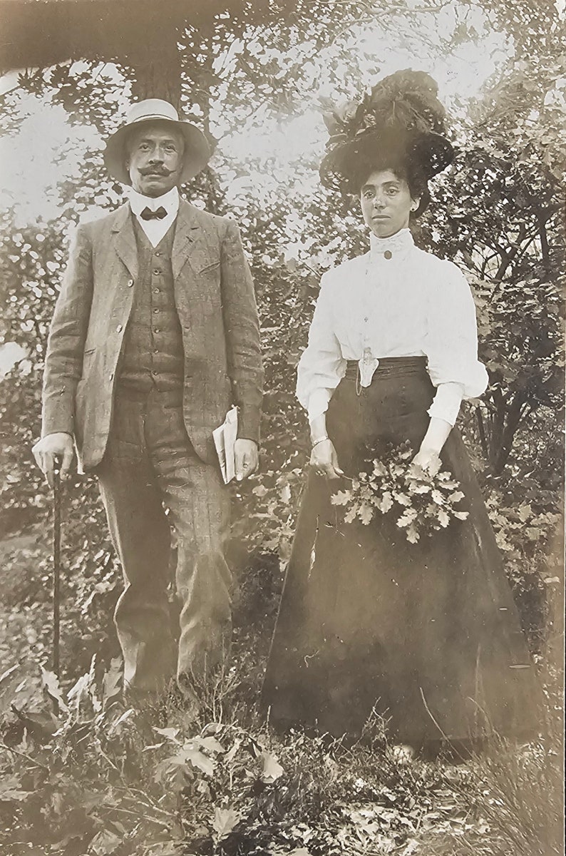 Intriguing Couple Portrait /// Edwardian Lady with Gentleman /// Woodland /// Original Antique French Real Photo Postcard /// Year 1904 imagen 1