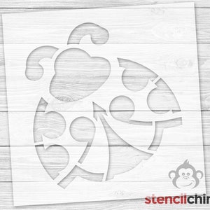May include: A white stencil of a ladybug with a circle of dots around the body. The stencil is designed for painting or crafting.