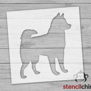 May include: A stencil of a dog silhouette, perfect for creating a unique and personalized design on walls, furniture, or crafts.