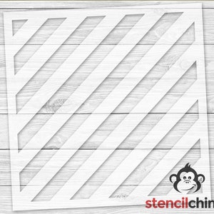 May include: White stencil with a diagonal striped pattern. The stencil is made of a durable material and is perfect for creating a variety of projects.