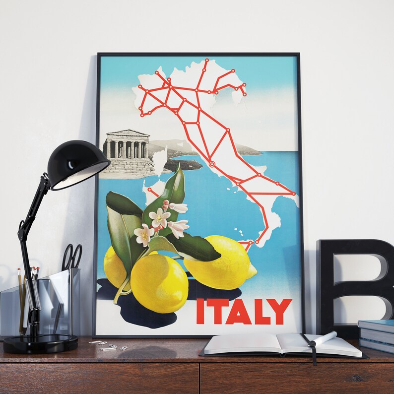 May include: A vintage travel poster depicting a map of Italy with red lines connecting cities. The poster has a blue background with a lemon tree and lemons in the foreground. The text "ITALY" is printed in red at the bottom of the poster.