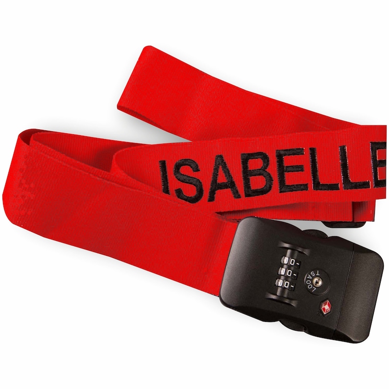 May include: Red luggage strap with a black combination lock and the word "ISABELLE" embroidered in black.