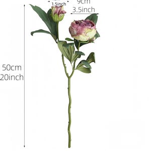 May include: A single artificial peony stem with a large, open flower and a bud. The flower is a mix of pink and cream, measuring 3.5 inches across. The stem is 20 inches long, with green leaves. The bud is 1.5 inches wide.