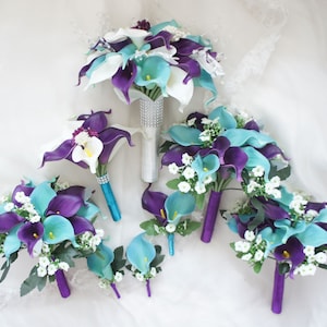 May include: A set of six bridal bouquets featuring white, teal, and purple calla lilies with white baby's breath.