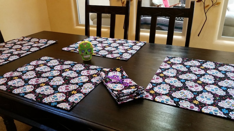 Sugar Skull Place Mats with Four Matching Cloth Napkins.