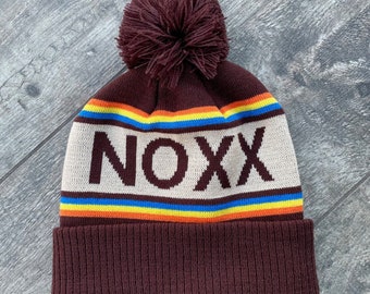 Noxx Logo Pom Pom Hat / One Size Fits Most Kids & Adults / Rainbow Thick Warm Knit Beanie / Ski Snowboard Beanie / Slouchy Pom-Pom Hat