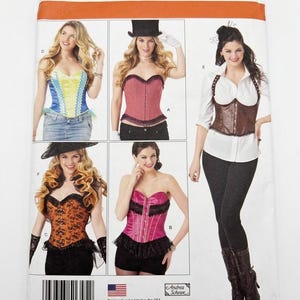 May include: A Simplicity sewing pattern envelope 1345 H5 featuring illustrations of five different corset styles. The pattern includes sizes U.S. 6, 8, 10, 12, 14, Euro 32-40, and Fr. 34-42. The front displays various corset designs in colors like yellow, pink, brown, and orange.
