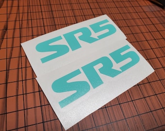 2 calcomanías superpuestas con el emblema SR5 para los laterales de Tacoma 2016-2023