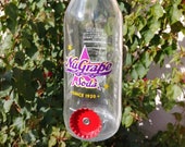Hummingbird Soda Fountain (Right-side-upcycled NuGrape Soda Bottle Hummingbird Feeders)