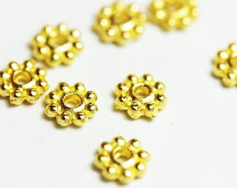 200pcs Hallazgos de joyería Daisy Spacers Metal chapado en oro, agujero de 5 * 1 mm, 1 mm - FDS0006