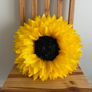 Oversized 20” paper sunflower with a black center for rustic wedding decor, sunflower themed parties, and home decor.