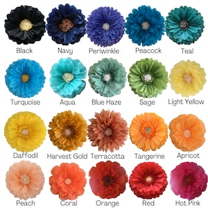 May include: A chart of 18 tissue paper flowers in various colours, including black, navy, periwinkle, peacock, teal, turquoise, aqua, blue haze, sage, light yellow, daffodil, harvest gold, terracotta, tangerine, apricot, peach, coral, orange, red, and hot pink.