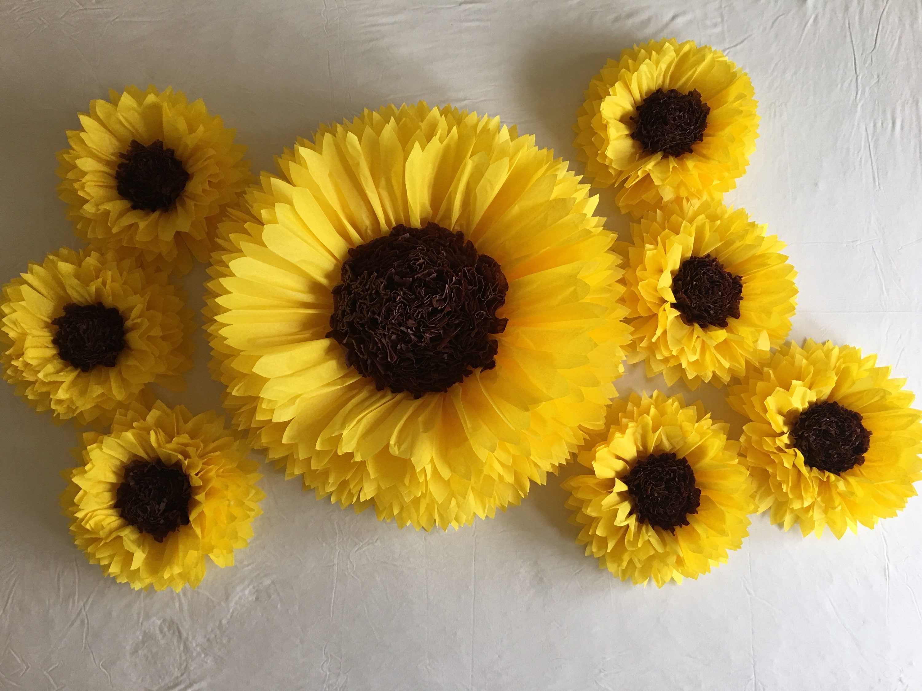 Paper sunflower wall for rustic wedding decor shower decor and photo props
