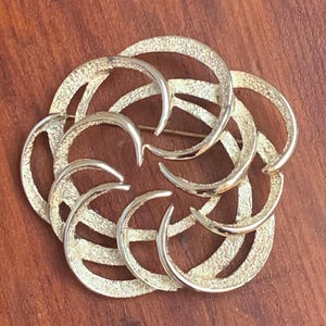 Vintage Sarah Coventry Silver Tone Open Work Spiral Flower Brooch