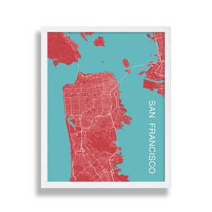 May include: A red and white map of San Francisco, California, printed on a turquoise background. The map is framed in a white frame.