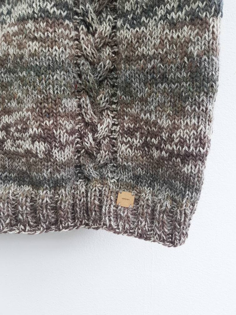Woolen sweater for men with cabels made out of pure sheepwool.